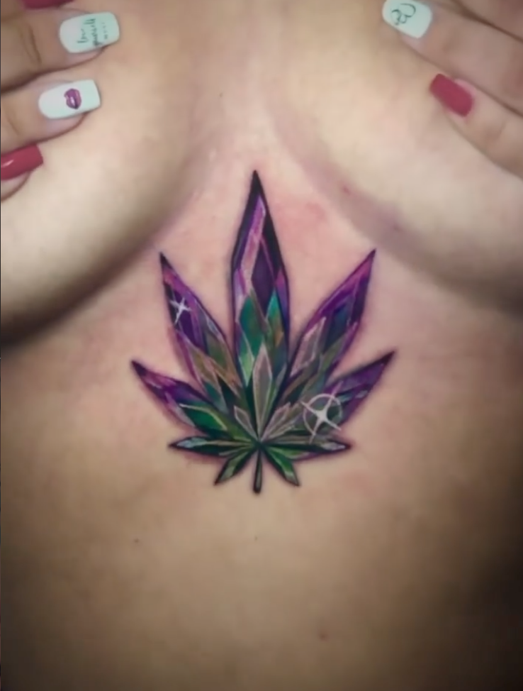 Small color crystalline leaf tattoo in purple and green